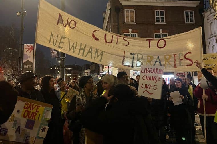 Library campaigners with banner reading