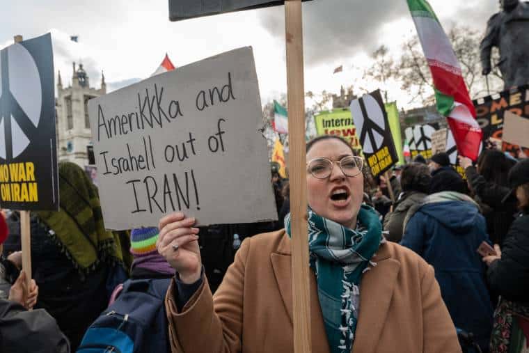 Anti-war protester with placard
