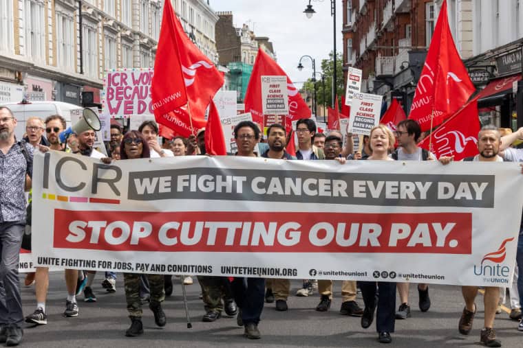 Institute of Cancer Research workers march through London at the end of June alongside general secretary of Unite union, Sharon Graham.