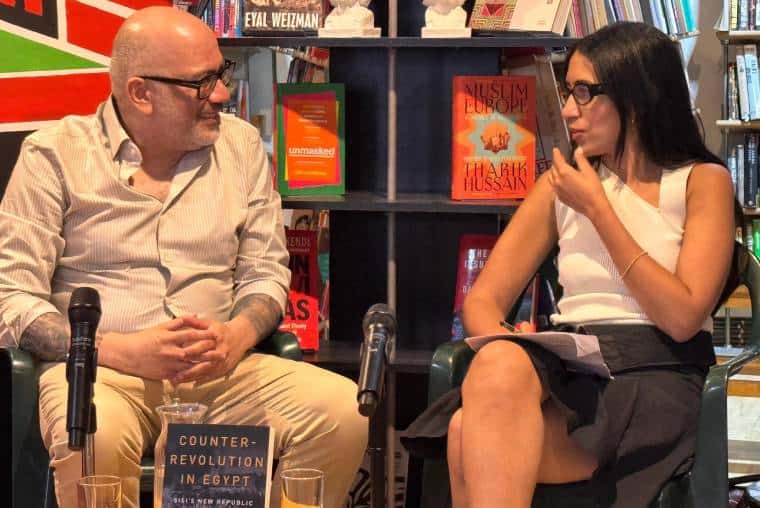 Hossam launching his book at Bookmarks bookshop in London