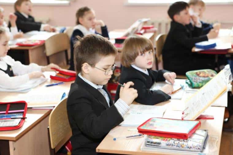 School children wearing uniform in school